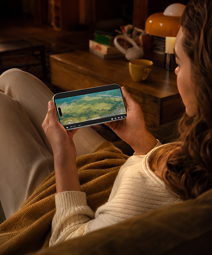 Watching a high-contrast night scene on a phone held landscape in a dark room