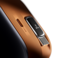 Close-up of the brown FlexLine Pro 60W charger's retractable USB-C connector and T-Ice vent