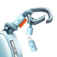 Close-up of the TORRAS PackGo Cube 10K carabiner clip and its detachable USB-C to Lightning adapter