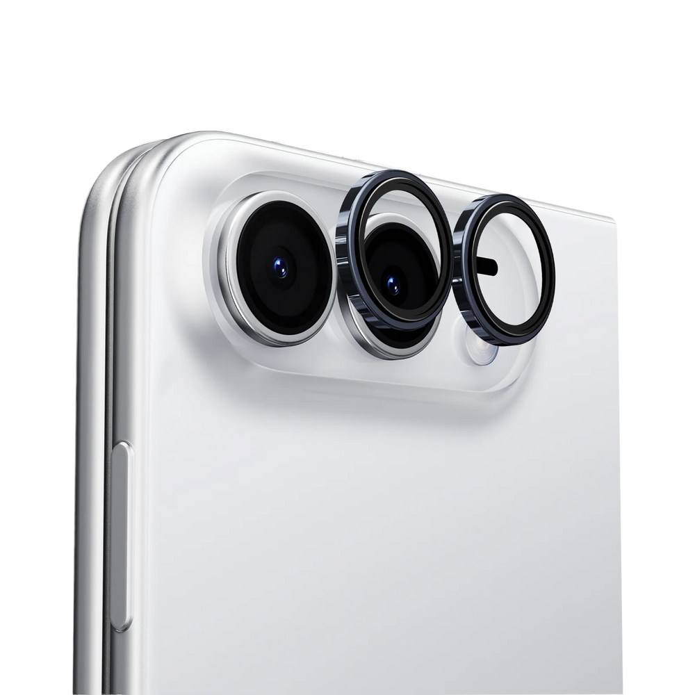 Close-up of a phone's camera area with individual dark blue-rimmed lens protector rings seated over each lens