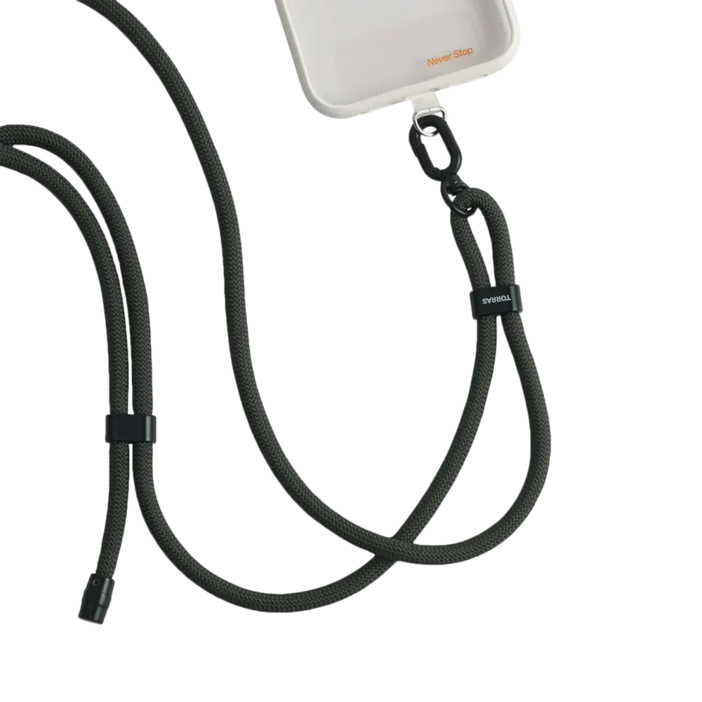 LoopGo Flex crossbody phone lanyard in dark olive, clipped to a clear phone case