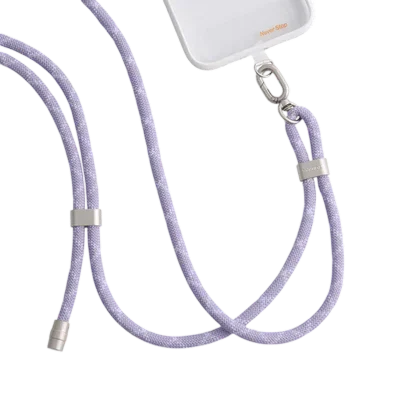 LoopGo Flex crossbody phone lanyard in lilac, clipped to a phone case on black