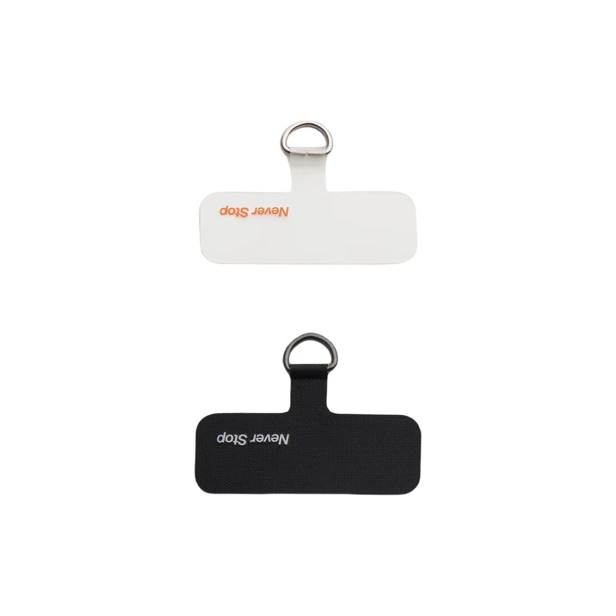 Black and white lanyard adapter pads that slot between phone and case