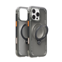 Two graphite TORRAS Ostand Air cases shown front and back, one with its ring stand swung out from the MagSafe circle