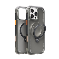 Two graphite TORRAS Ostand Air cases shown front and back, one with its ring stand swung out from the MagSafe circle