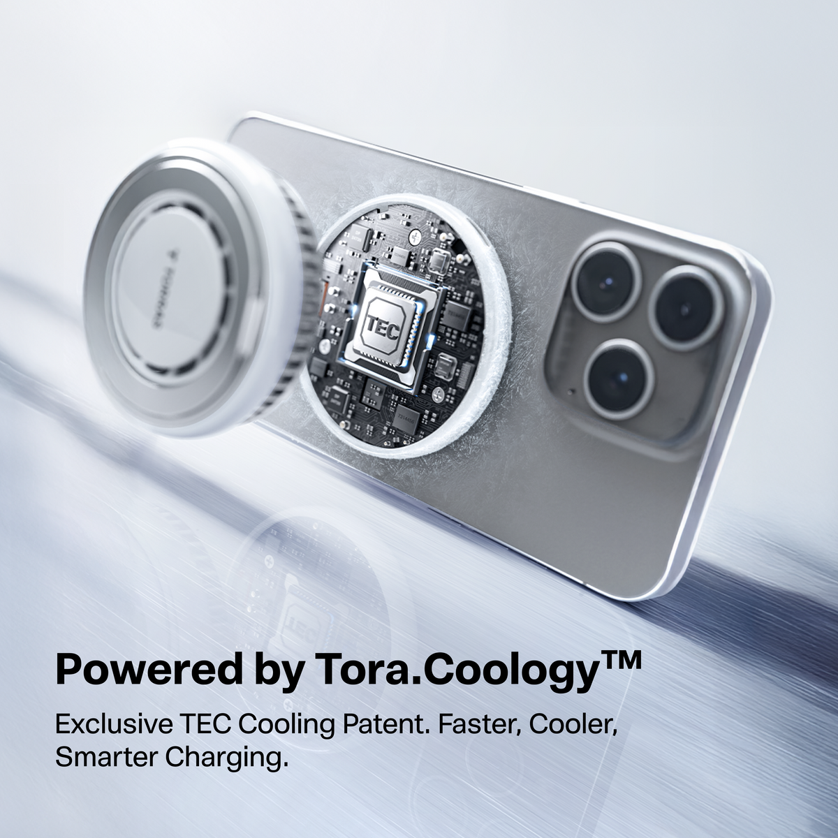 Cutaway view of the PolarCircle charger on a phone revealing the Tora.Coology TEC cooling chip and circuit board inside