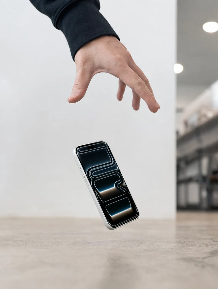 iPhone protected by TORRAS HD Shield glass surviving a 12ft drop — lab-tested 3X shock-absorbing core