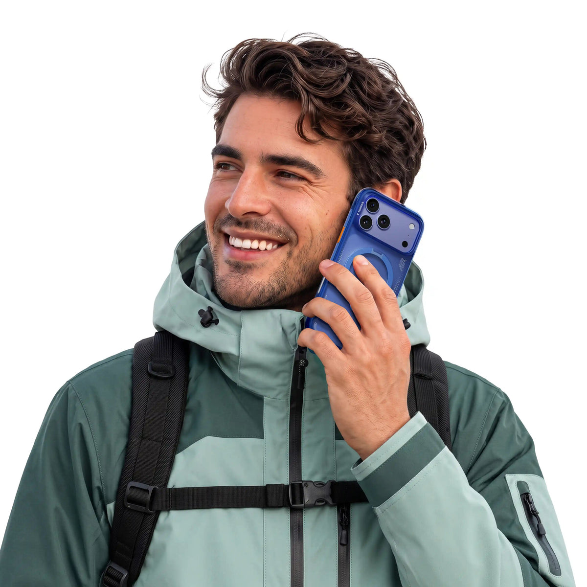 Man in a mint-green jacket holding an iPhone 18 Pro in the blue Ostand Q3 Air case up to his ear