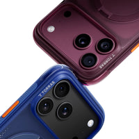 Close-up of two Ostand Q3 Air camera corners, plum above and blue below, showing the TORRAS wordmark and orange side button