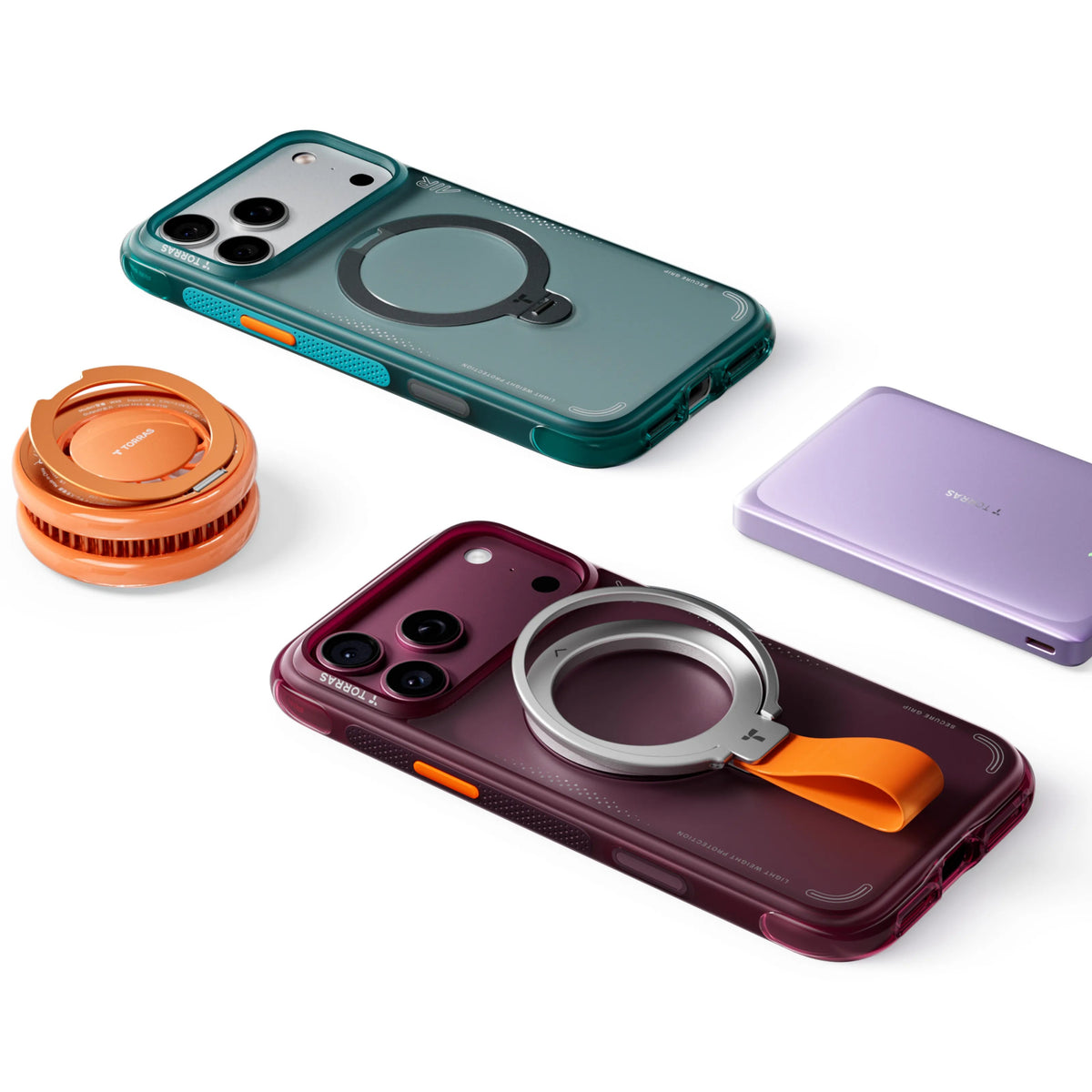 Flat lay of green and plum Ostand Q3 Air cases with a TORRAS orange magnetic mount and a lilac power bank