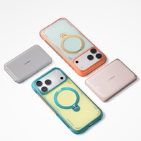 Flat lay of coral and teal Q3 Air Summer cases with two TORRAS magnetic power banks