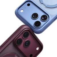 Close-up of two Q3 Spin camera corners, Horizon Blue above and wine-purple Dusk Purple below