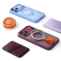 Flat lay of blue and purple Q3 Spin cases with a TORRAS cup mount, power bank and card wallet