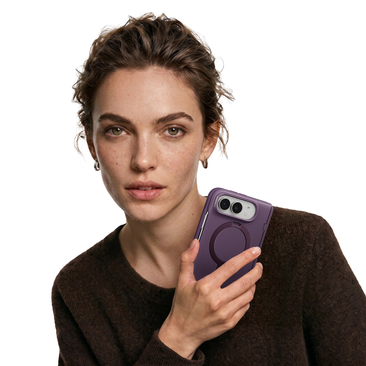 Woman holding a folded phone in a Purple Ostand Q3 Spin case near her face