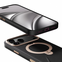 Close-up of the black VegSkin case's gold ring and camera bezel below an iPhone 18 Pro Max screen and charge port