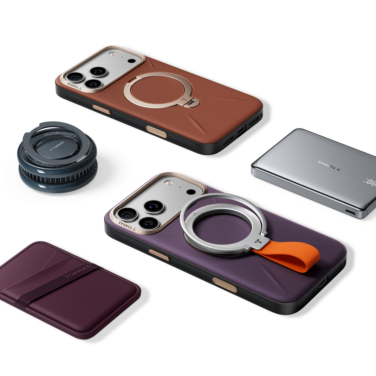 Flat lay of brown and plum VegSkin cases with a TORRAS magnetic mount, power bank and card wallet