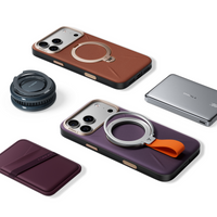 Flat lay of brown and plum VegSkin cases with a TORRAS magnetic mount, power bank and card wallet