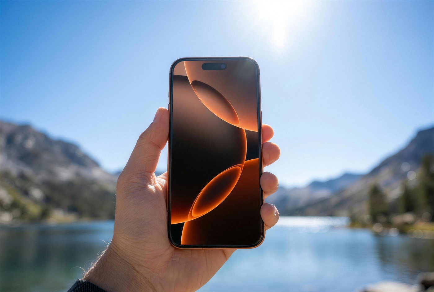 iPhone 17 Pro with SunView AR screen protector held up under direct sunlight, screen fully readable with no glare