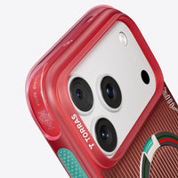 Close-up of the FPF case's red frame, embossed federation crest and teal grip pad