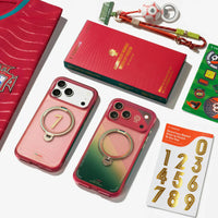 Flat lay of the FPF retail box, jersey, ball keyring, number stickers and two FPF cases