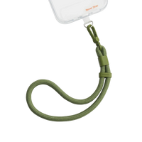LoopGo Flex wrist phone lanyard in olive green, clipped to a clear phone case