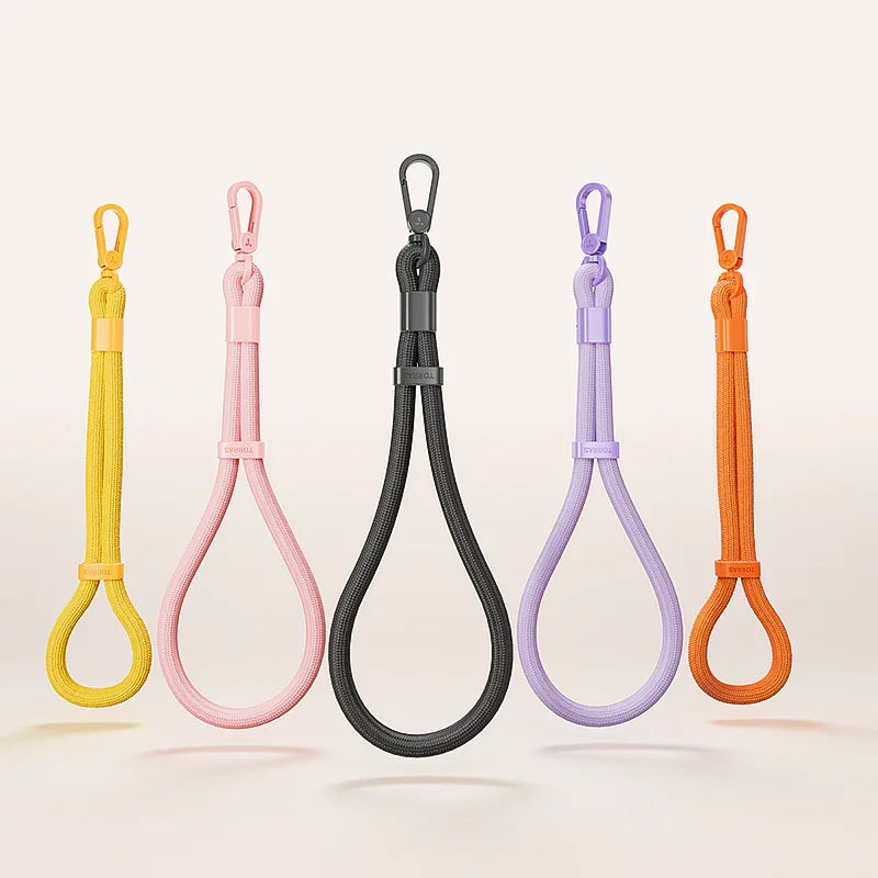LoopGo Flex wrist phone lanyard in yellow, pink, black, lilac and orange lined up
