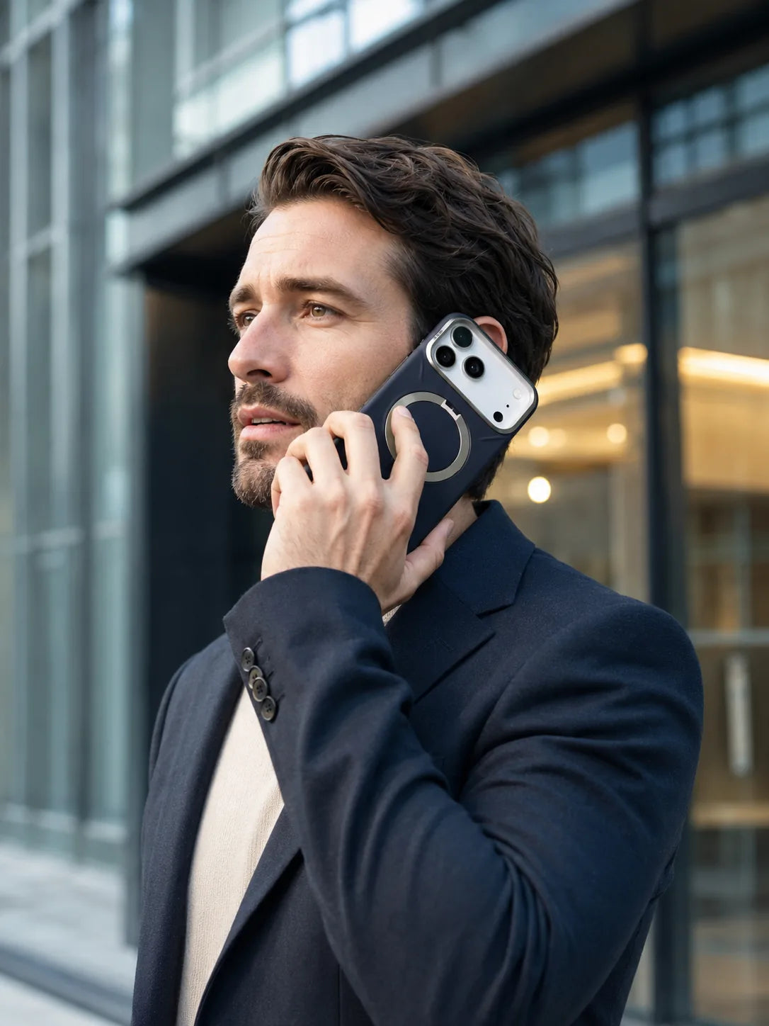 Desk-to-carry moment — iPhone in a low-profile TORRAS Ostand case during a work day.